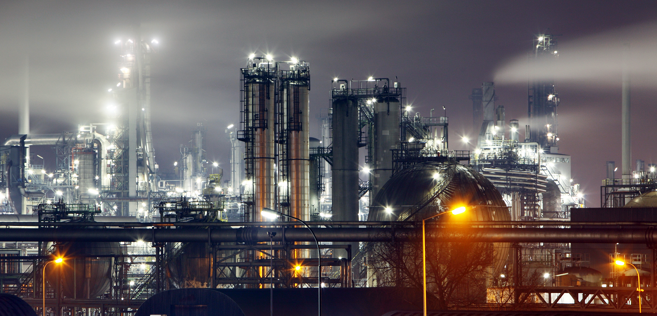 oil refinery at night factory, petrochemical industry